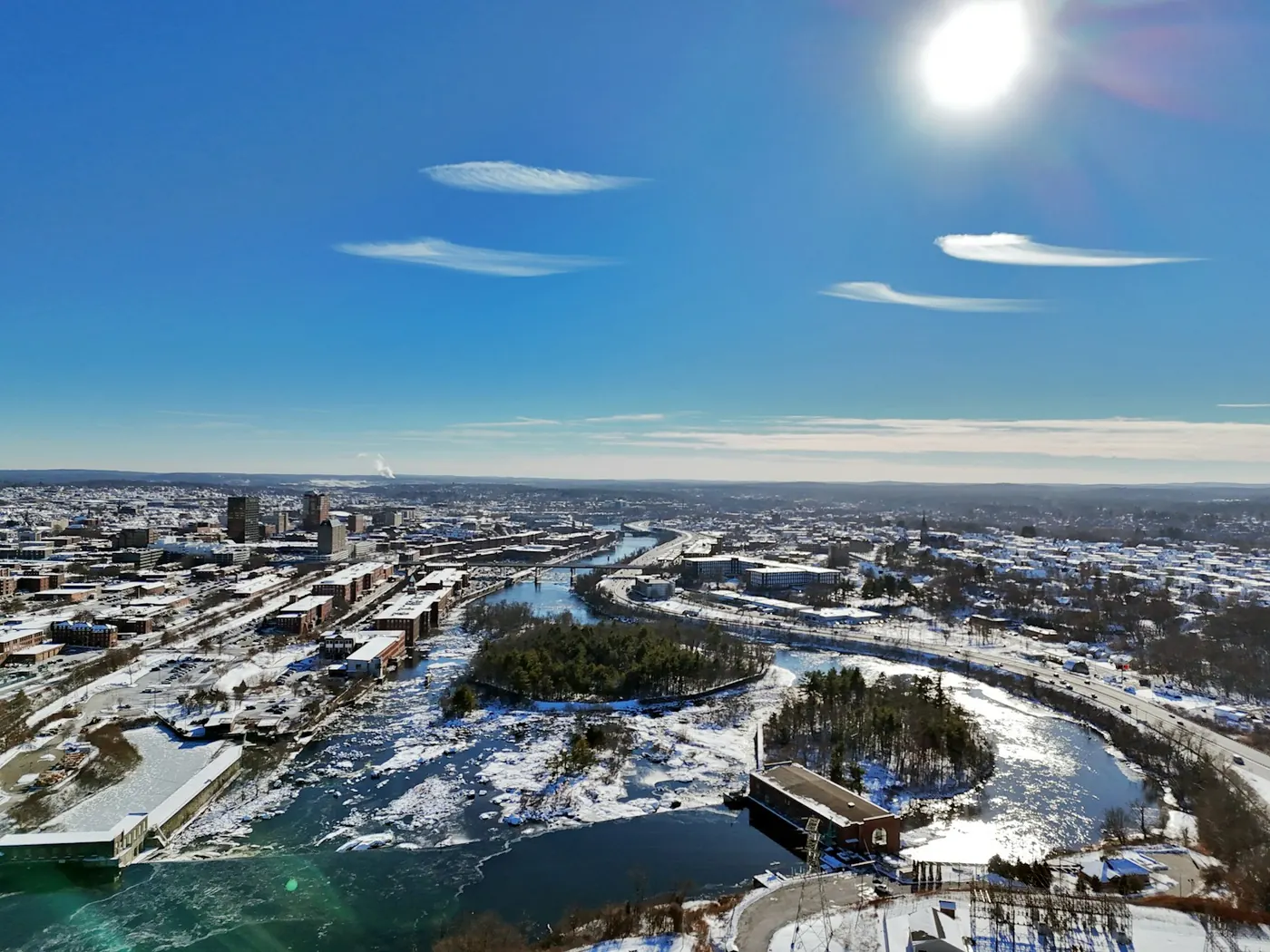 Manchester, New Hampshire cityscape along the Merrimack River - Tides Health